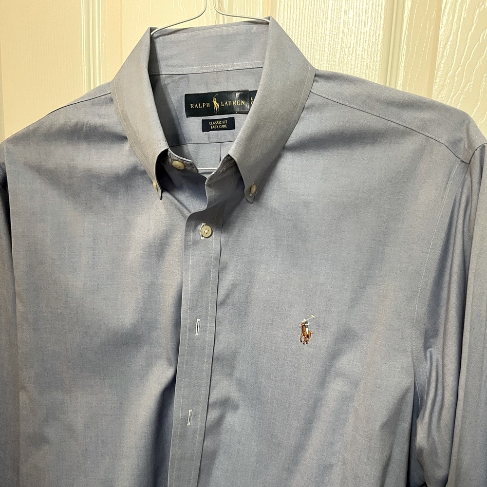 Men’s polo large/size 17 button down in light blue. Great condition.